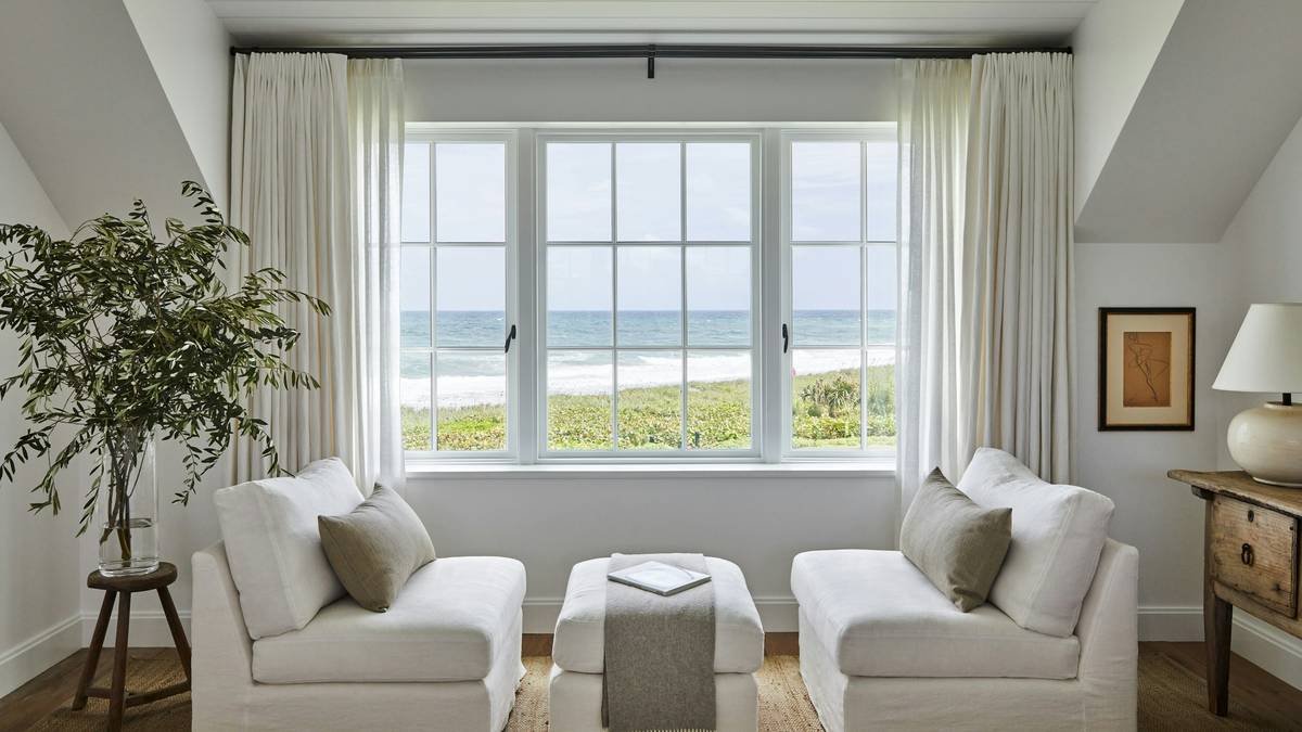 Comparison chart showing durability of teak vs. synthetic wicker in humid coastal climates