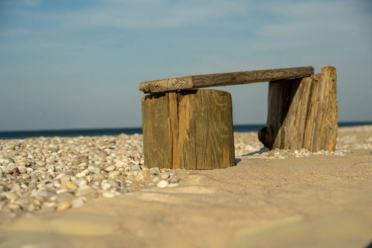 Close-up detail of coastal style interior design characteristics including woven textures and sea-inspired neutral palette